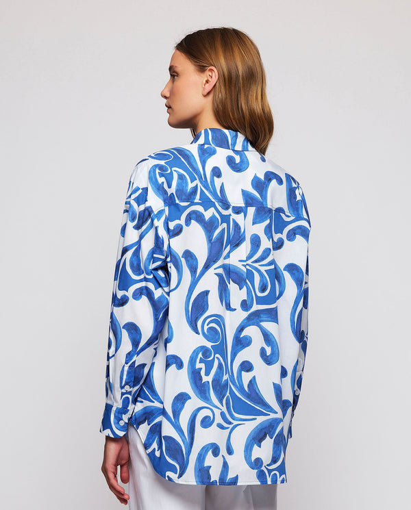 White shirt with  blue ornamental print by MIRTO