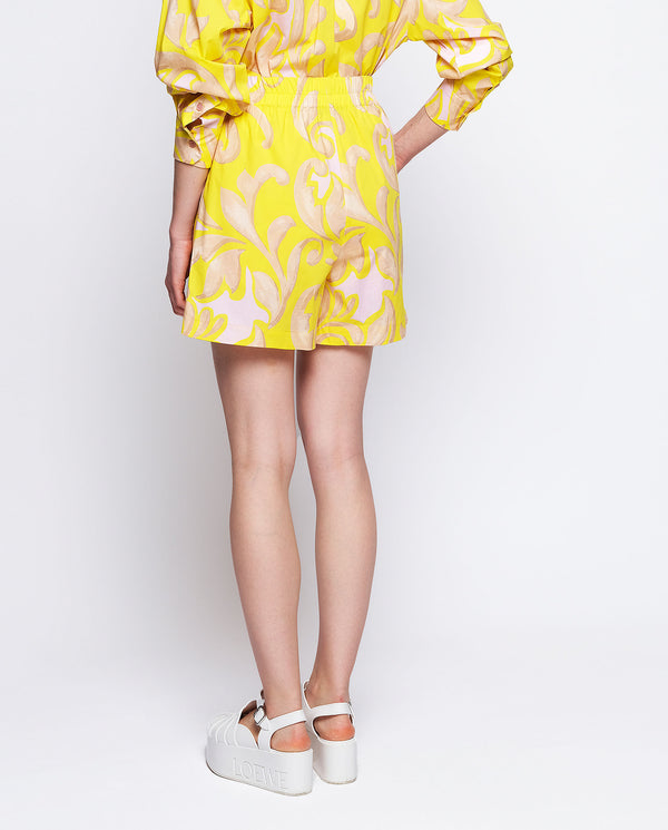 Yellow ornamental print shorts by MIRTO