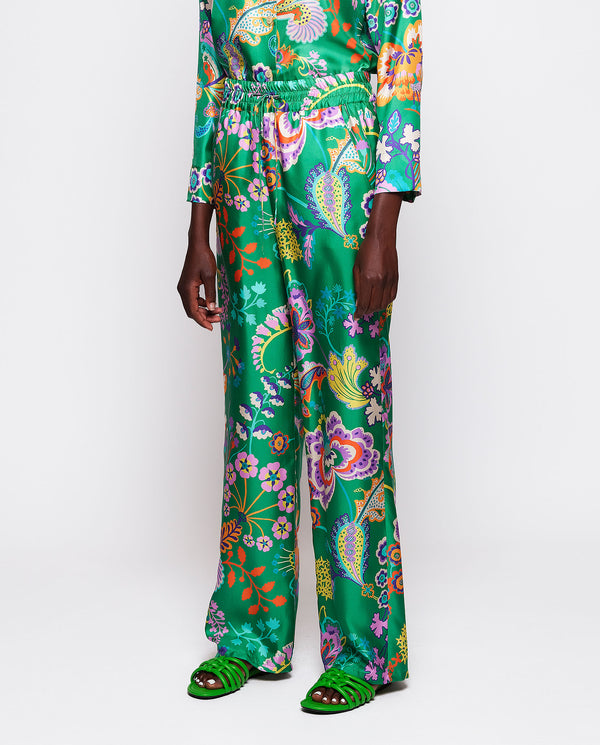 Green silk floral print trousers by MIRTO