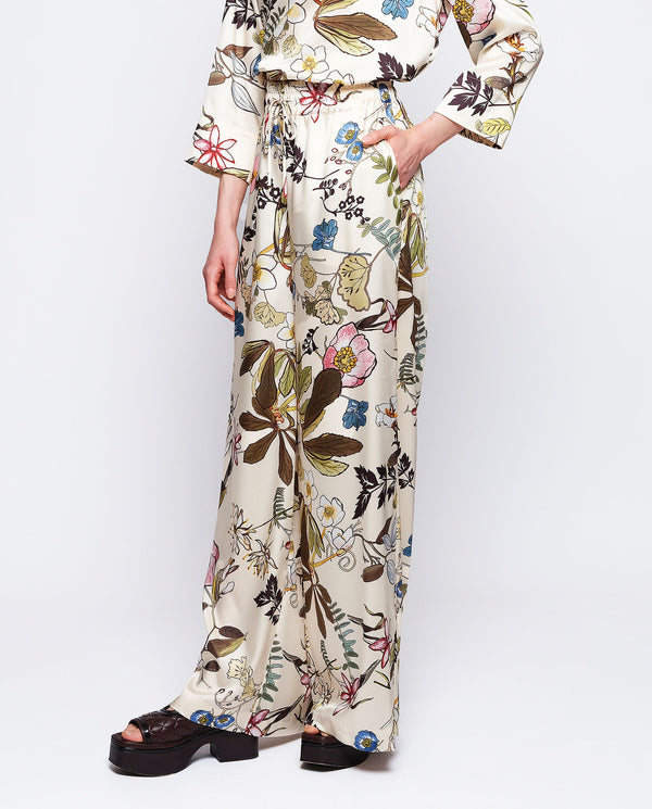 Botanical floral print fluid trousers by MIRTO