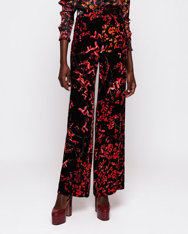 Black & red print velvet trousers by MIRTO