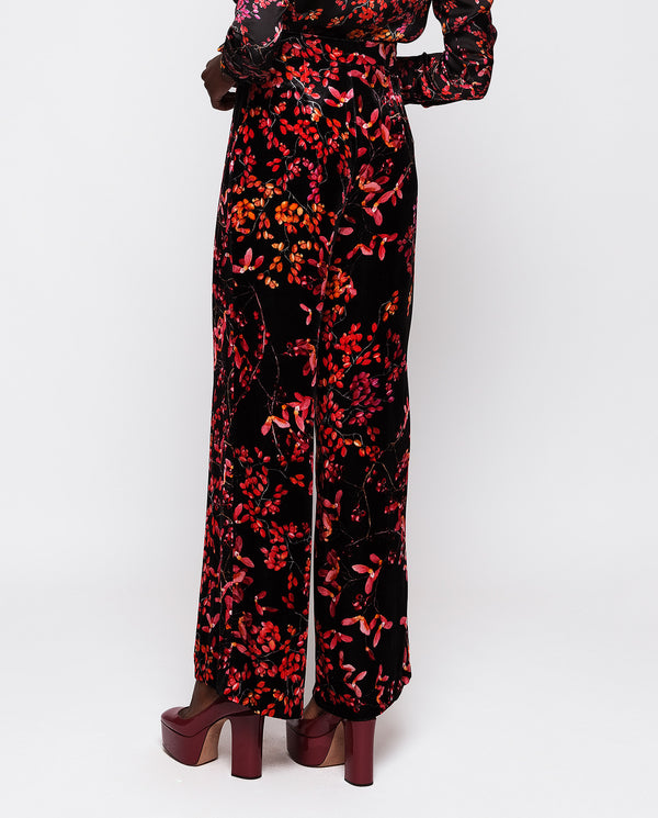 Black & red print velvet trousers by MIRTO