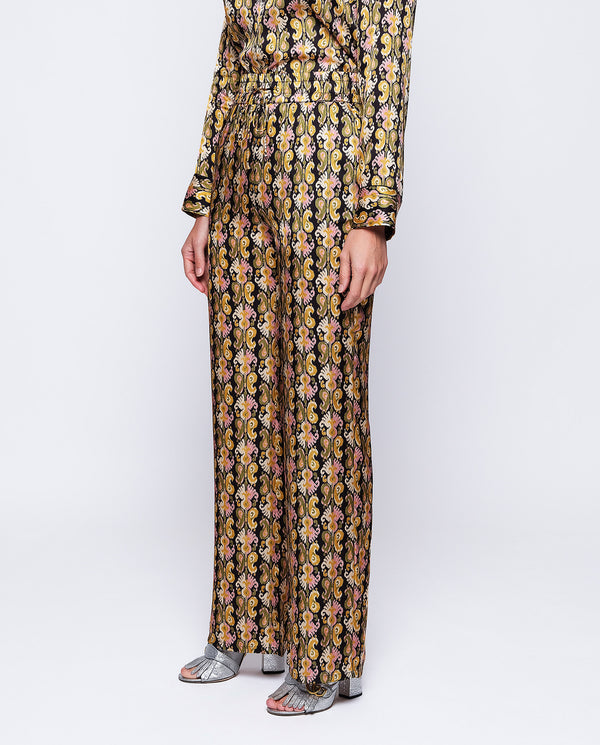 Black background paisley print trousers by MIRTO