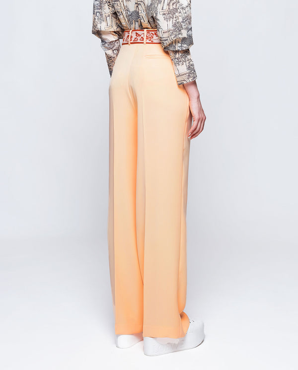 Peach orange fluid trousers. by MIRTO