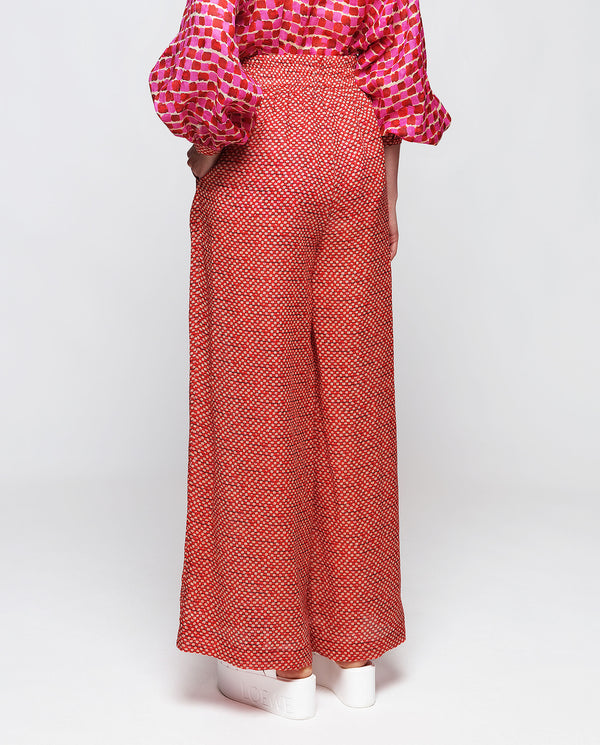 Red ramie mosaic print trousers by MIRTO