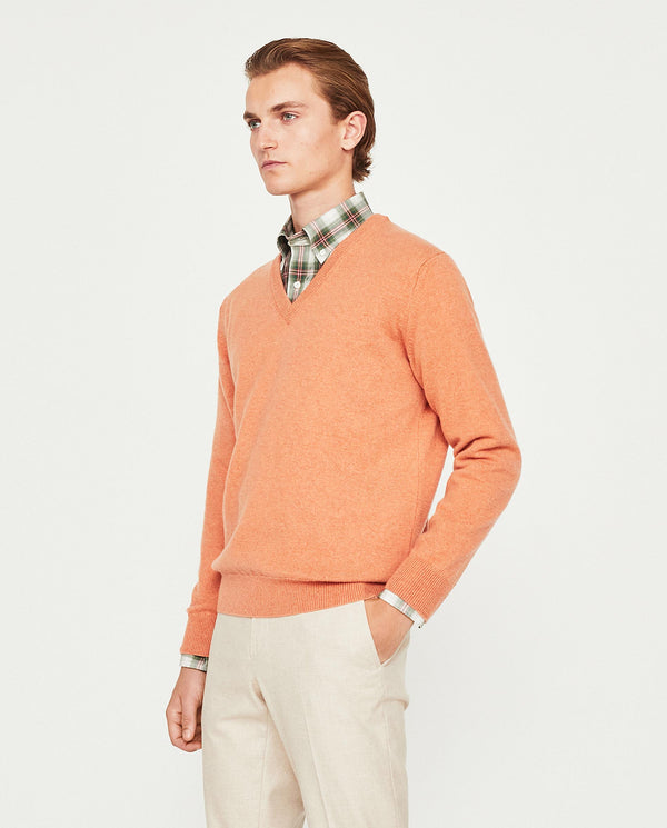 Light orange knit V neck jumper