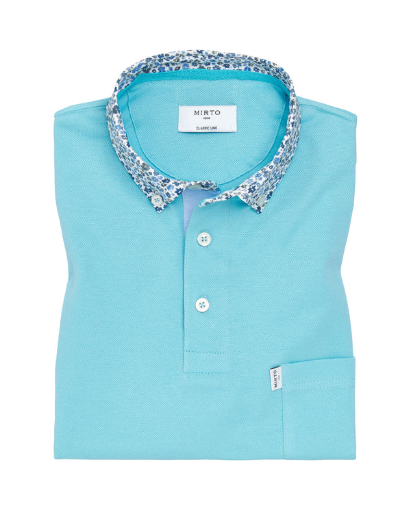 Light blue polo with breast pocket by MIRTO