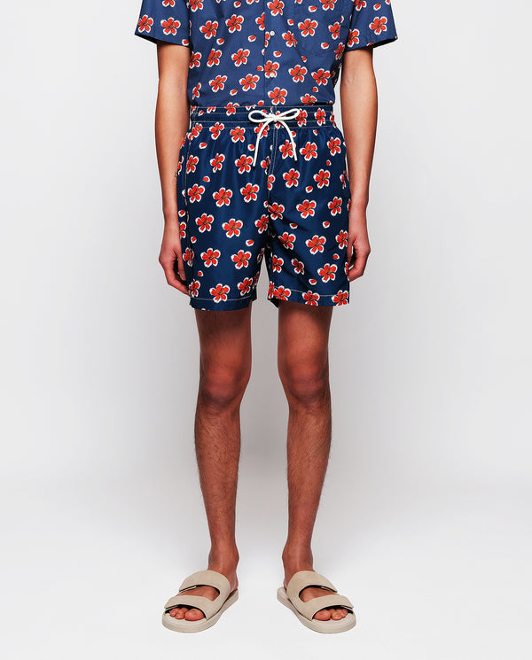 Red & blue flower print swim shorts by MIRTO